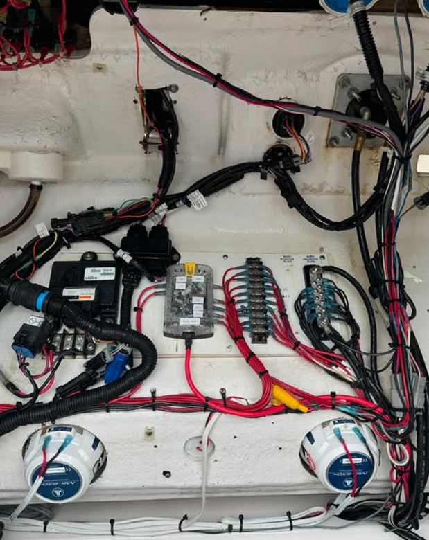 Console harness cleanup with a new fuse block, bus bars and loomed, secured cable runs