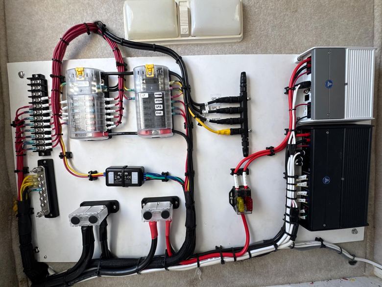 Custom rigging board with dual fuse blocks, bus bars, NMEA 2000 drops and amplifiers